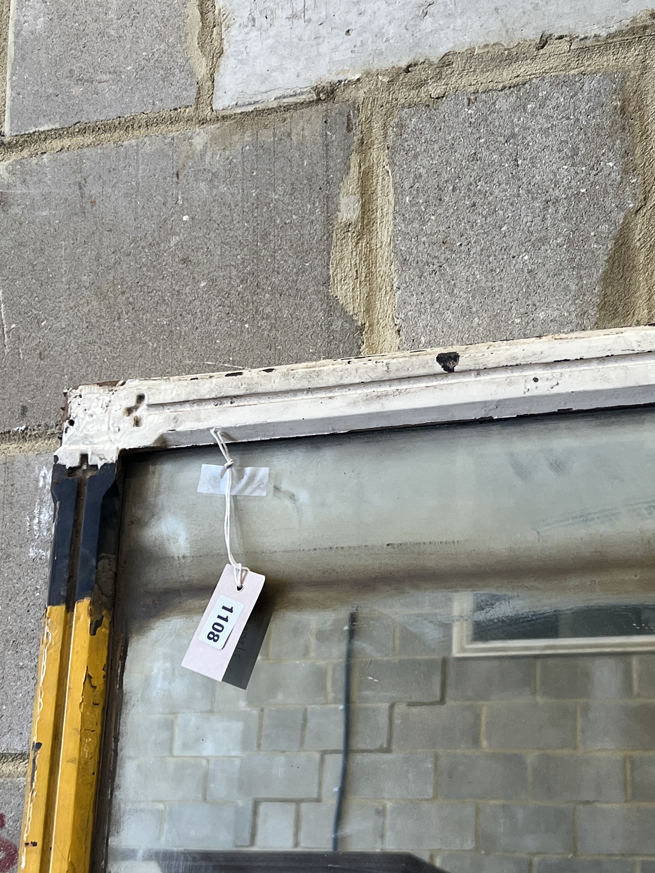 A late Victorian later painted overmantel mirror, width 134cm, height 186cm